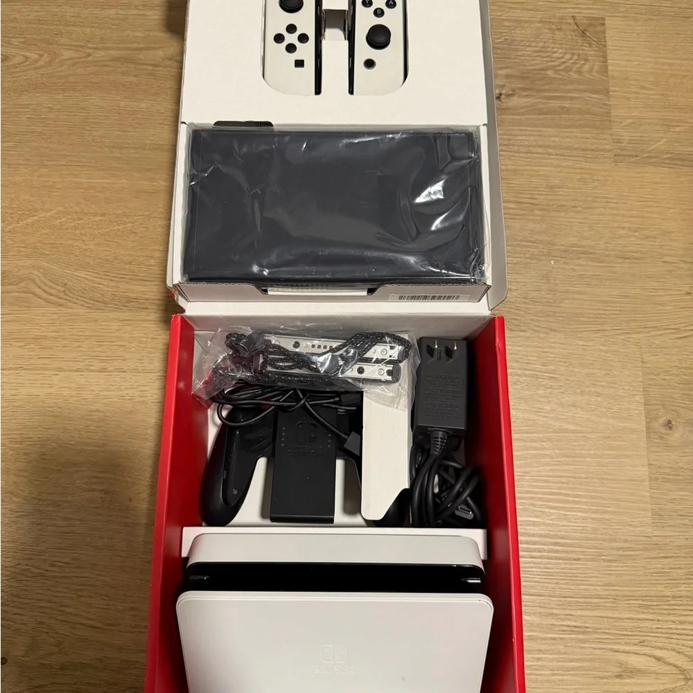 Nintendo Switch OLED (White) bundle. comes with all original parts and cords.